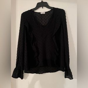 small Black women’s blouse. It has really pretty detailing.